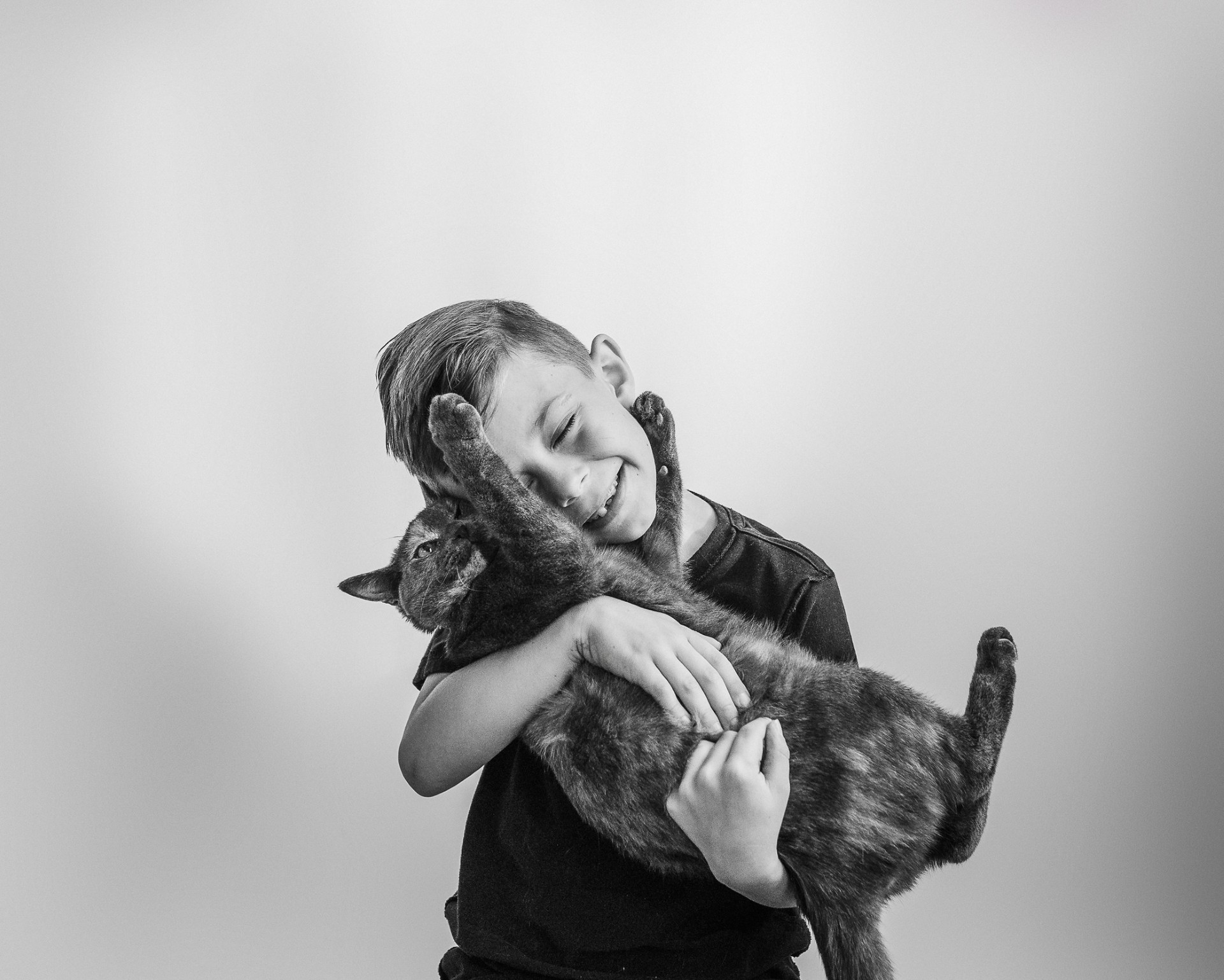 Woman Rescues Cat From Streets—Her 7-Year-Old Already Has Plans for Him