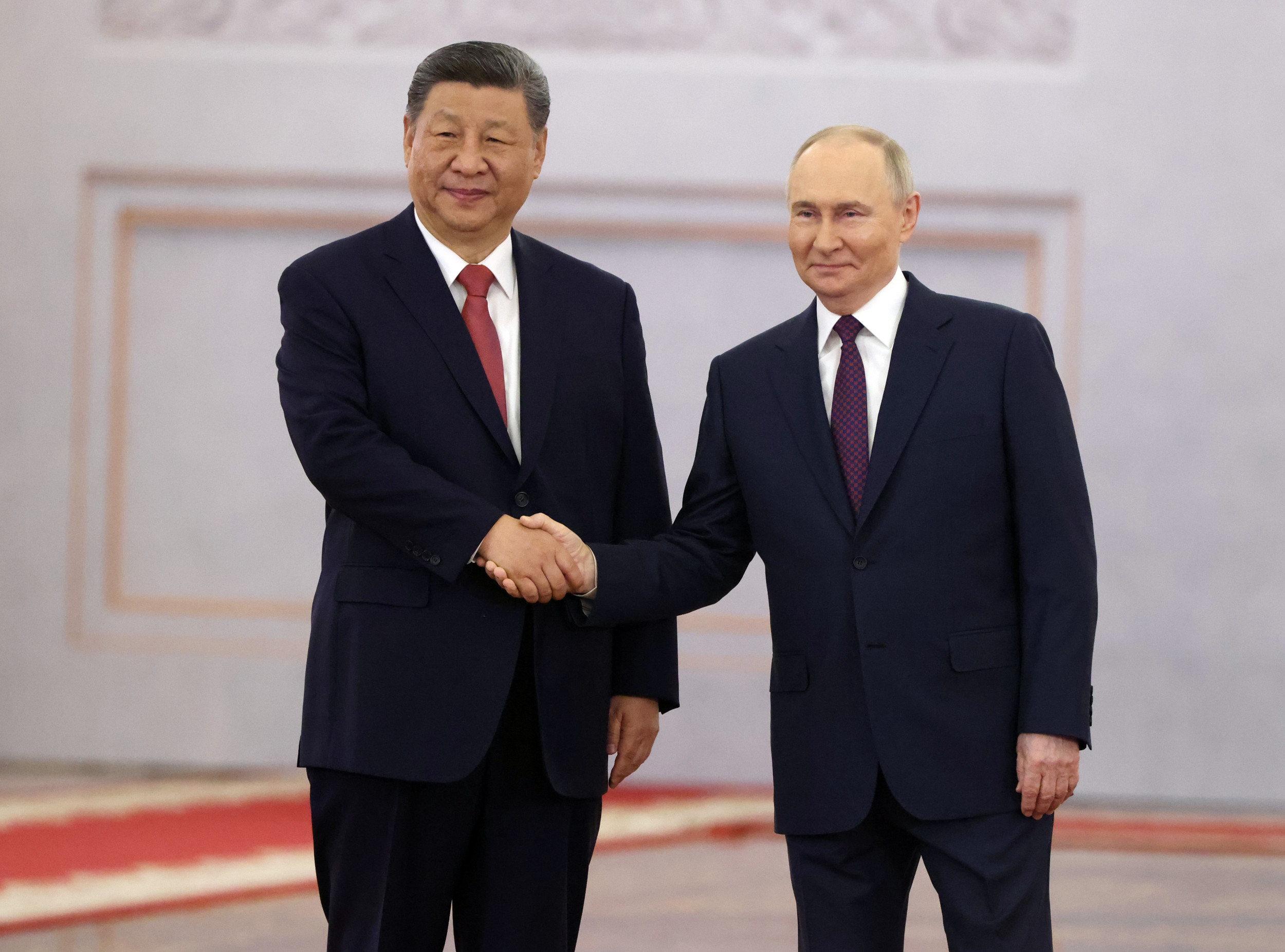 Watch: Putin Courts Xi With Full Pomp